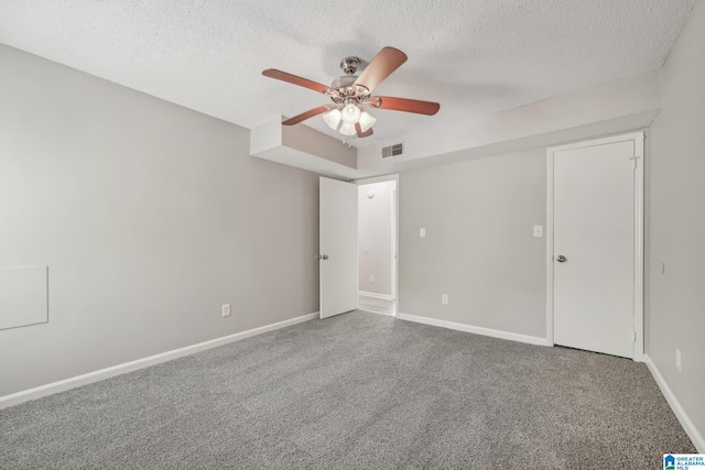 1056 Cardinal Cir, Hueytown, AL 35023 - unfurnished bedroom featuring carpet, a textured ceiling, baseboards, and a ceiling fan