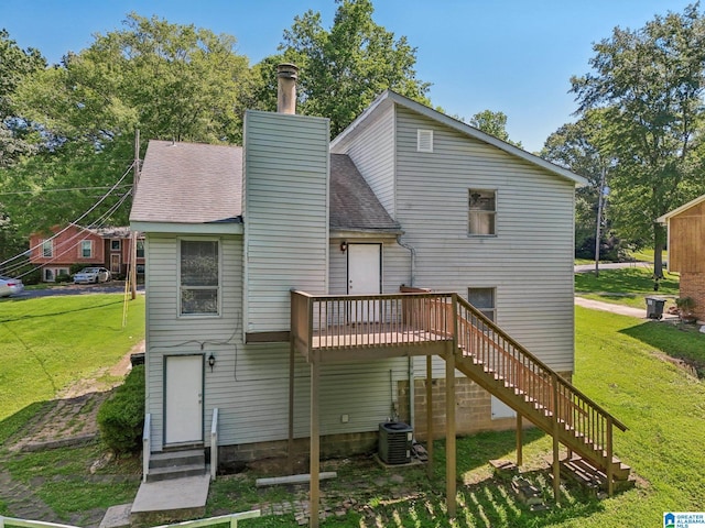 1056 Cardinal Cir, Hueytown, AL 35023 - back of house featuring stairway, a lawn, a wooden deck, and a chimney