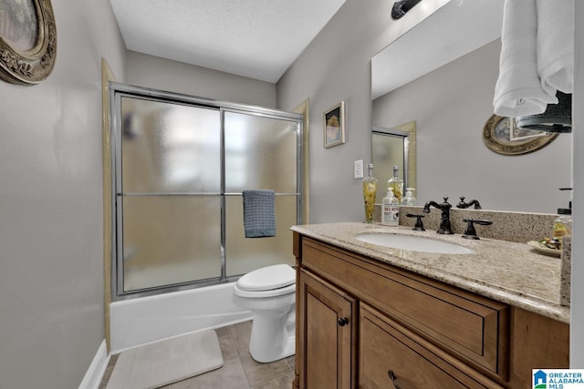 14 County Road 279, Cullman, AL 35057 - full bath with vanity, toilet, bath / shower combo with glass door, and tile patterned floors