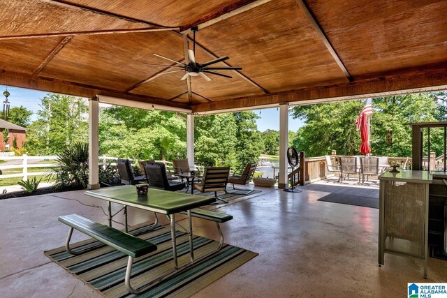 14 County Road 279, Cullman, AL 35057 - view of patio / terrace featuring outdoor dining area, a ceiling fan, a gazebo, and view of wooded area