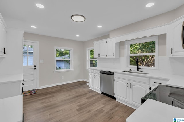 7300 6th Ave S, Birmingham, AL 35206 - kitchen featuring stainless steel dishwasher, a sink, light countertops, white cabinets, and recessed lighting