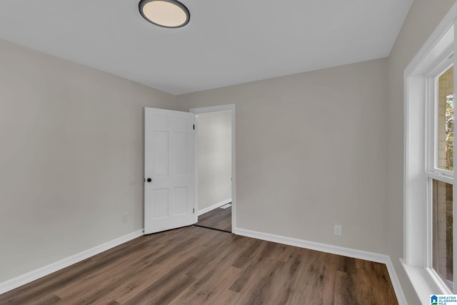 7300 6th Ave S, Birmingham, AL 35206 - spare room featuring wood finished floors and baseboards