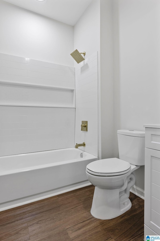 3010 15th St, Ensley, Birmingham, AL 35208 - bathroom featuring toilet, bathtub / shower combination, and wood finished floors