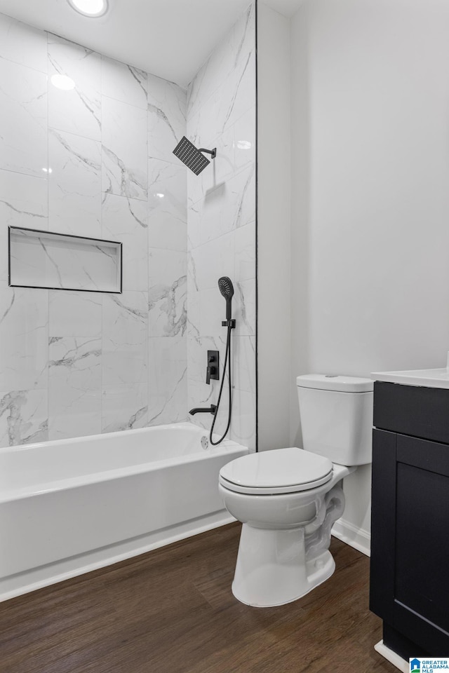 3010 15th St, Ensley, Birmingham, AL 35208 - bathroom featuring toilet, vanity, shower / bath combination, wood finished floors, and baseboards