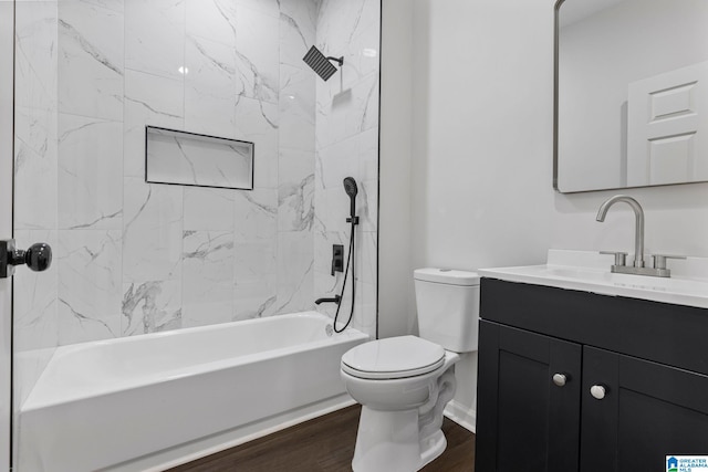 3010 15th St, Ensley, Birmingham, AL 35208 - bathroom with vanity, toilet, tub / shower combination, and wood finished floors
