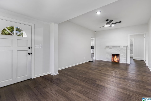 3010 15th St, Ensley, Birmingham, AL 35208 - entryway with a ceiling fan, dark wood-type flooring, baseboards, and a fireplace