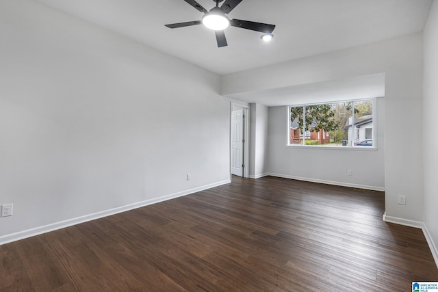 3010 15th St, Ensley, Birmingham, AL 35208 - spare room with a ceiling fan, baseboards, and dark wood-type flooring