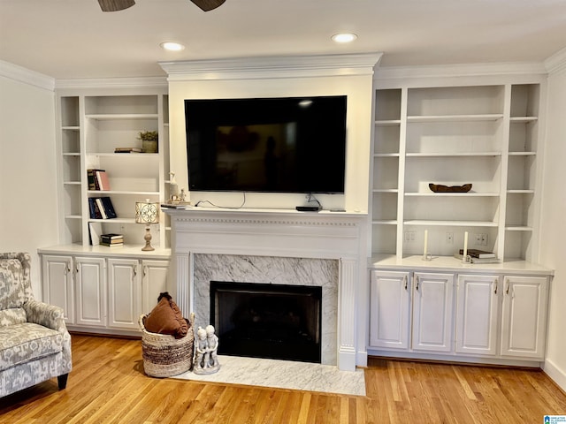 200 Quail Ridge Rd, Oneonta, AL 35121 - living area featuring light wood-type flooring, ceiling fan, ornamental molding, and a fireplace