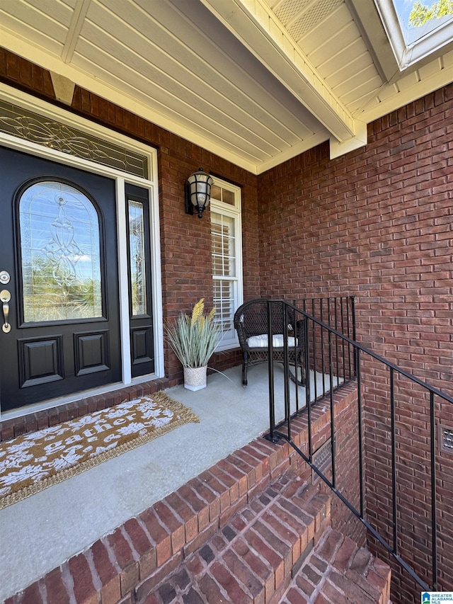 200 Quail Ridge Rd, Oneonta, AL 35121 - doorway to property featuring covered porch and brick siding