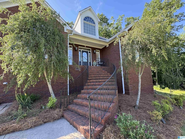 200 Quail Ridge Rd, Oneonta, AL 35121 - view of front facade with brick siding, stairs, and a porch