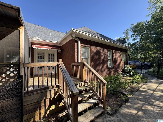 200 Quail Ridge Rd, Oneonta, AL 35121 - view of exterior entry featuring brick siding, roof with shingles, and a gate