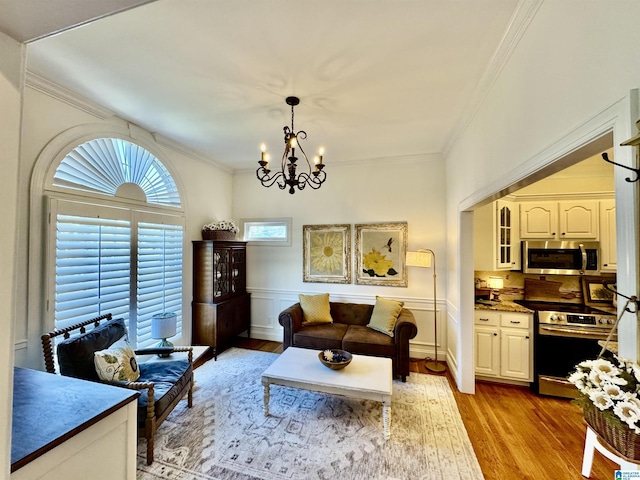 200 Quail Ridge Rd, Oneonta, AL 35121 - living room featuring light wood-style floors, a chandelier, and crown molding