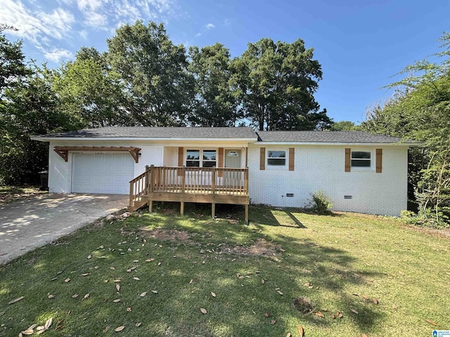 913 Alexandria Rd, Weaver, AL 36277 - ranch-style home with an attached garage, a front yard, concrete driveway, crawl space, and brick siding