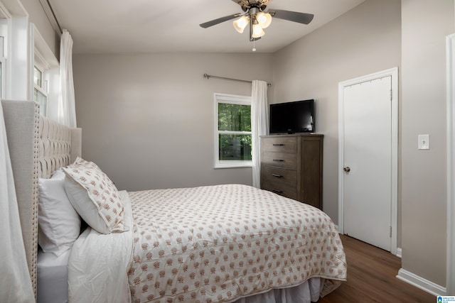 1345 Cresthill Rd, Birmingham, AL 35213 - bedroom with wood finished floors, lofted ceiling, baseboards, and a ceiling fan
