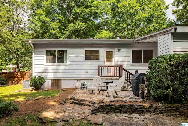 1345 Cresthill Rd, Birmingham, AL 35213 - back of house with a patio area and central AC