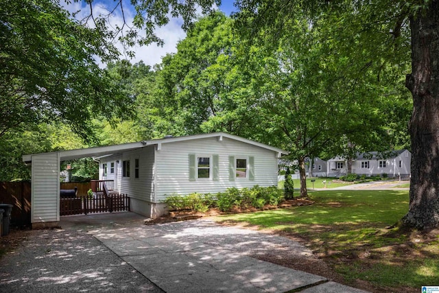 1345 Cresthill Rd, Birmingham, AL 35213 - view of front of house with concrete driveway and an attached carport