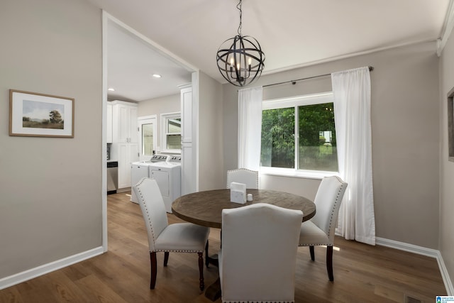 1345 Cresthill Rd, Birmingham, AL 35213 - dining area featuring baseboards, wood finished floors, a chandelier, recessed lighting, and separate washer and dryer