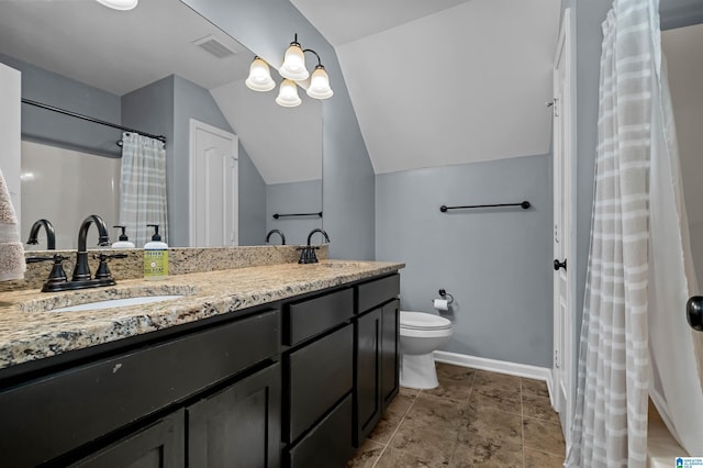 204 Forest Pkwy, Alabaster, AL 35007 - full bathroom with double vanity, toilet, vaulted ceiling, and baseboards