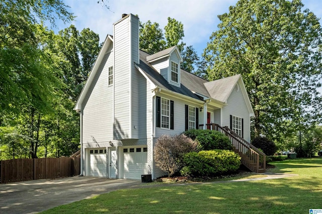 204 Forest Pkwy, Alabaster, AL 35007 - view of property exterior with an attached garage, concrete driveway, a chimney, and stairs