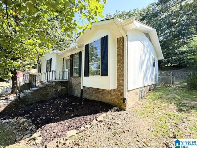 2723 6th St NE, Center Point, AL 35215 - view of side of property with brick siding
