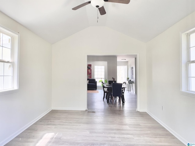 2723 6th St NE, Center Point, AL 35215 - unfurnished room featuring a ceiling fan, light wood finished floors, vaulted ceiling, and baseboards