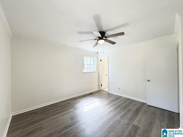 2723 6th St NE, Center Point, AL 35215 - unfurnished bedroom featuring ornamental molding, dark wood-type flooring, baseboards, and ceiling fan