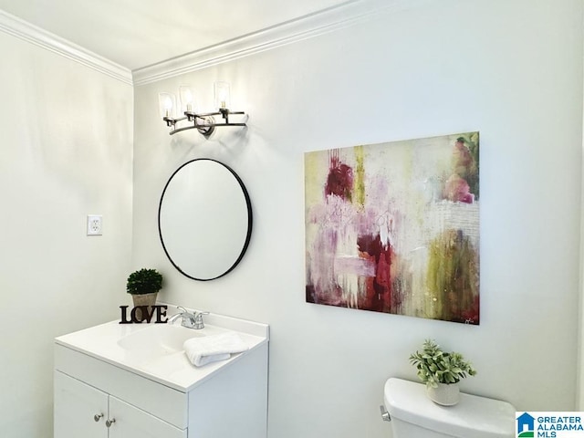 2723 6th St NE, Center Point, AL 35215 - half bath featuring vanity, ornamental molding, and toilet