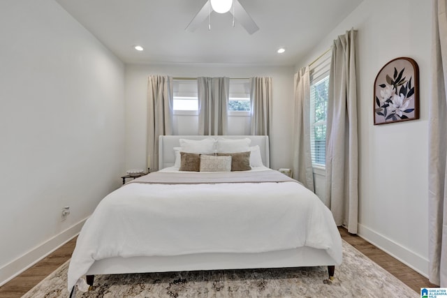 1505 36th St N, Birmingham, AL 35234 - bedroom with baseboards, wood finished floors, ceiling fan, and recessed lighting