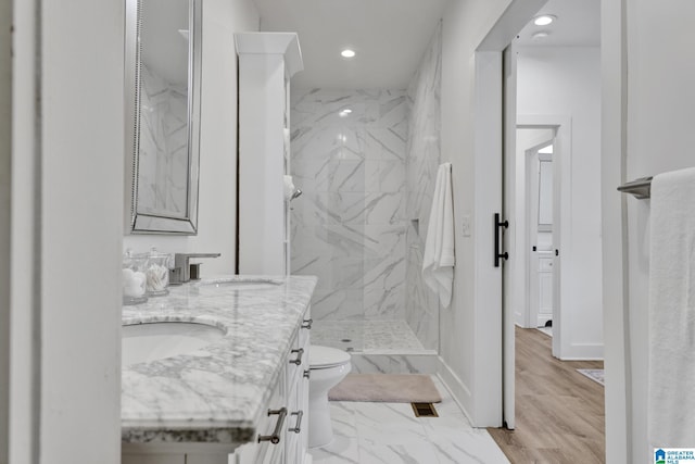 1505 36th St N, Birmingham, AL 35234 - full bath featuring double vanity, a marble finish shower, recessed lighting, toilet, and marble finish floors
