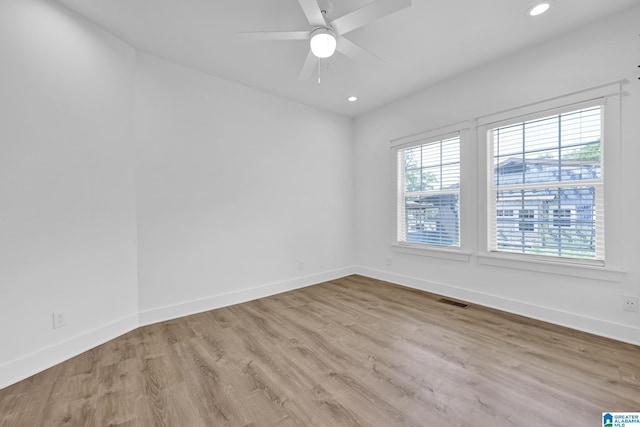 1505 36th St N, Birmingham, AL 35234 - empty room with baseboards, wood finished floors, recessed lighting, and ceiling fan