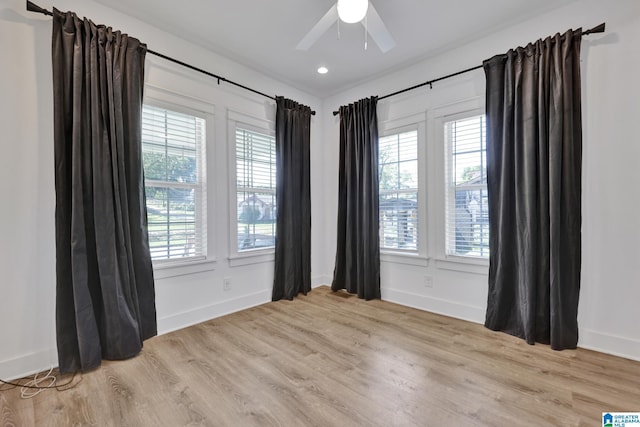 1505 36th St N, Birmingham, AL 35234 - spare room featuring light wood finished floors, a ceiling fan, baseboards, and recessed lighting