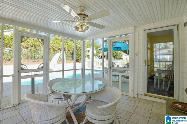 1937 Riva Ridge Rd, Helena, AL 35080 - sunroom with tile patterned flooring, a ceiling fan, and outdoor dining space