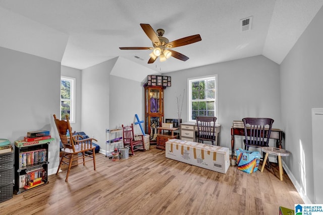 276 River Oak Trl, Hayden, AL 35079 - living area with wood finished floors, ceiling fan, baseboards, and lofted ceiling