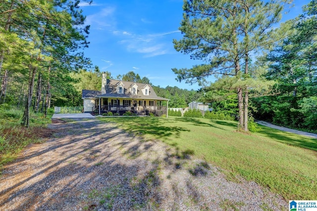 276 River Oak Trl, Hayden, AL 35079 - cape cod home with covered porch, a front lawn, a chimney, and dirt driveway