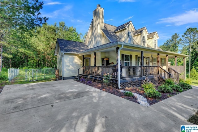 276 River Oak Trl, Hayden, AL 35079 - view of front of house with a porch, a chimney, and a shingled roof