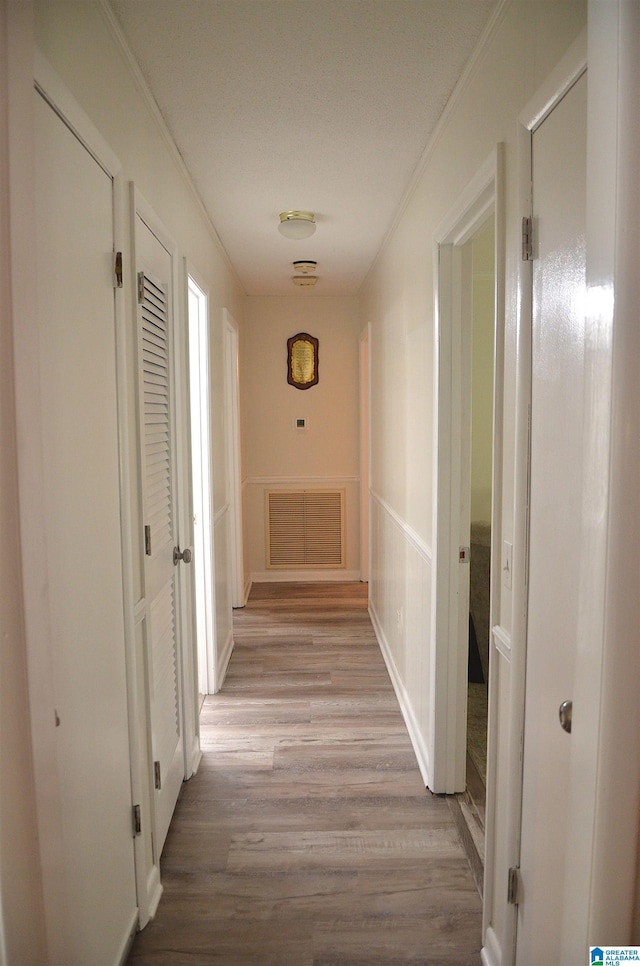 1679 Curry Hwy, Jasper, AL 35503 - corridor featuring light wood-style flooring and crown molding