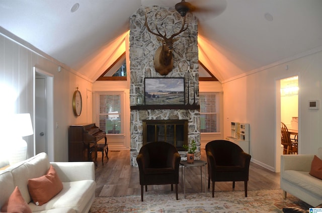 1679 Curry Hwy, Jasper, AL 35503 - living room with lofted ceiling, wood finished floors, a fireplace, baseboards, and ornamental molding