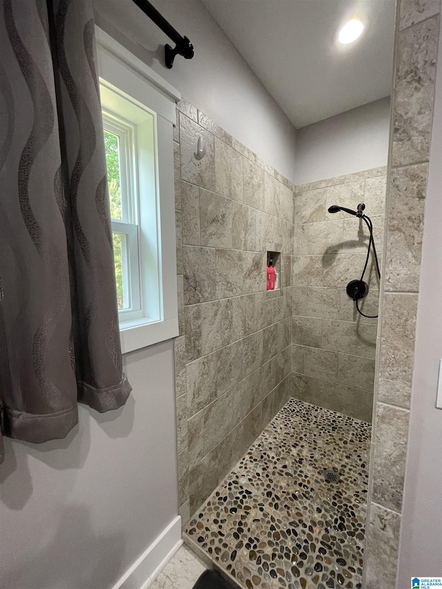 171 Sweetwater Dr, Wedowee, AL 36278 - full bathroom with a tile shower and baseboards