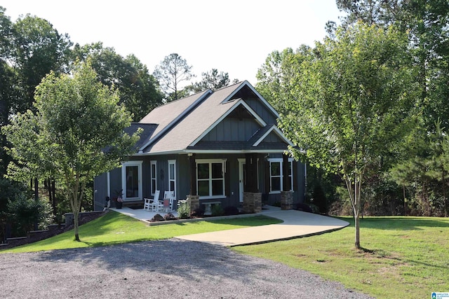 171 Sweetwater Dr, Wedowee, AL 36278 - craftsman house with a front yard, board and batten siding, and a shingled roof