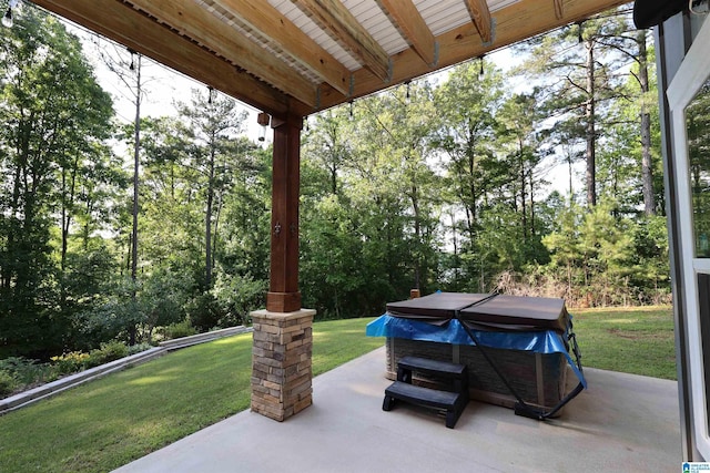 171 Sweetwater Dr, Wedowee, AL 36278 - view of patio / terrace with a hot tub and view of wooded area