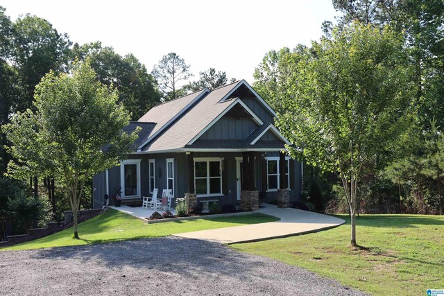 171 Sweetwater Dr, Wedowee, AL 36278 - craftsman house featuring a front lawn, board and batten siding, and a shingled roof