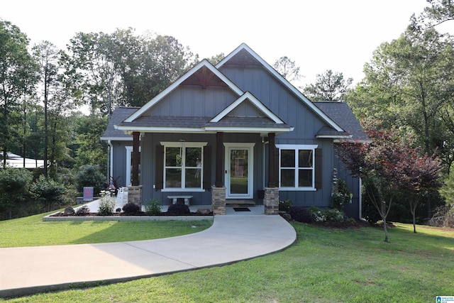 171 Sweetwater Dr, Wedowee, AL 36278 - craftsman inspired home with board and batten siding, a front yard, roof with shingles, and covered porch