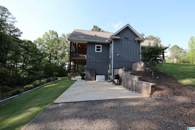 171 Sweetwater Dr, Wedowee, AL 36278 - rear view of property with a patio area, board and batten siding, a lawn, and a deck