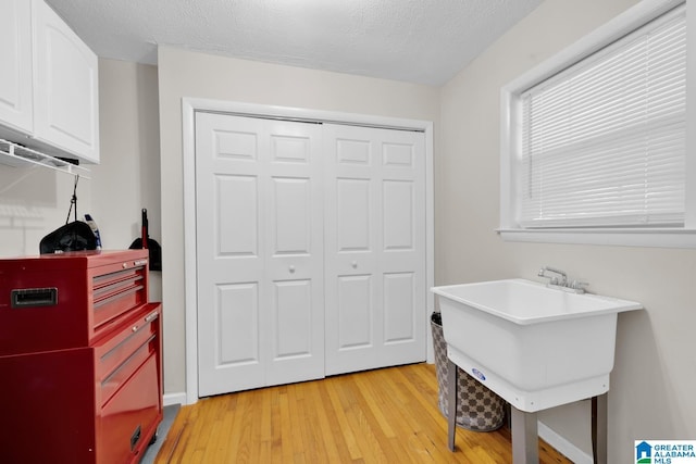 1416 11th St SE, Cullman, AL 35055 - washroom featuring light wood-type flooring