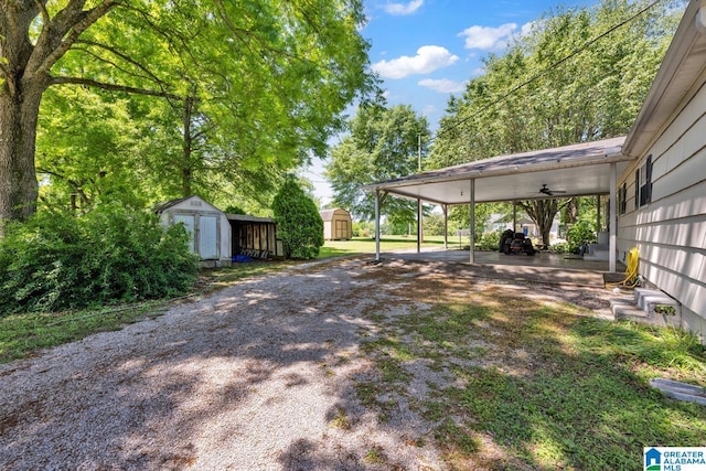 1416 11th St SE, Cullman, AL 35055 - view of yard with driveway and a detached carport