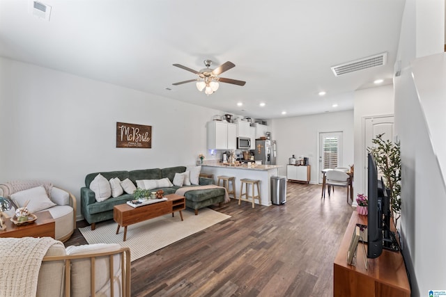 1063 Archers Trl E, Springville, AL 35146 - living room featuring dark wood-type flooring, a ceiling fan, and recessed lighting