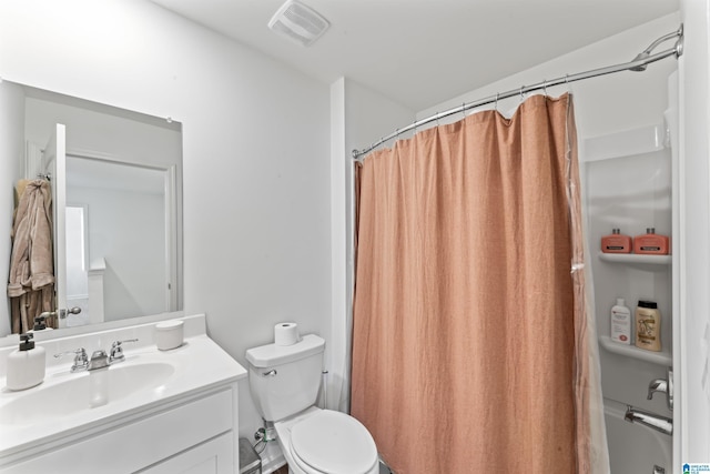 1063 Archers Trl E, Springville, AL 35146 - bathroom featuring vanity, toilet, and a shower with shower curtain