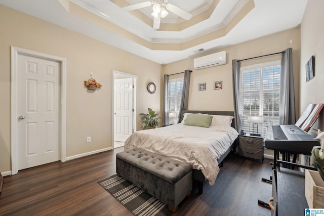 2093 Forest Lakes Ln, Sterrett, AL 35147 - bedroom with an AC wall unit, ornamental molding, a raised ceiling, dark wood-style floors, and baseboards