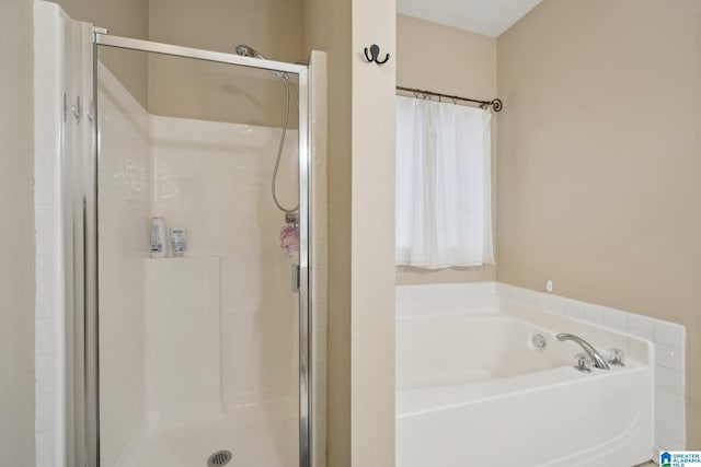 2093 Forest Lakes Ln, Sterrett, AL 35147 - bathroom with a shower stall and a garden tub