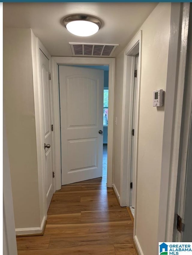 1861 Woodland Ave SW, Birmingham, AL 35211 - corridor featuring wood finished floors and baseboards